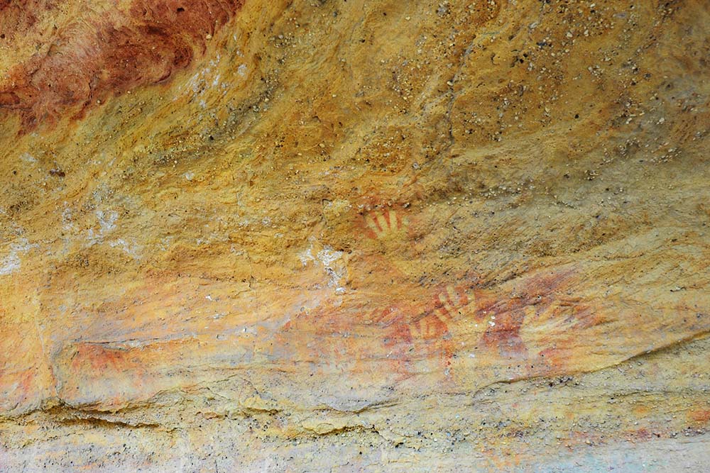 hands on rock aboriganal painting ulan nsw